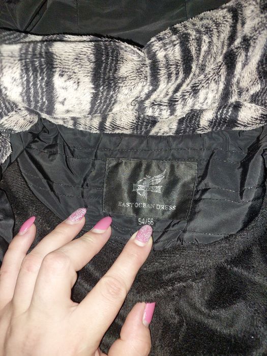 Женская куртка в отличном состоянии.