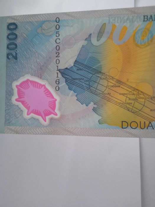 Bancnota de colecție, cu eclipsa, de 2000 lei, din 1999