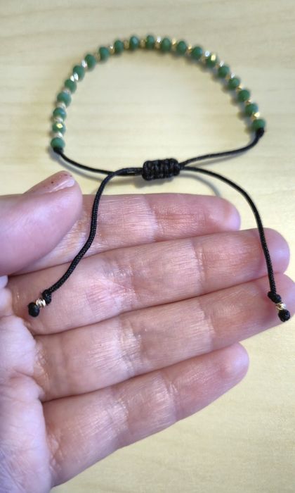 Bratara verde cu 21 bile de aur 14 k