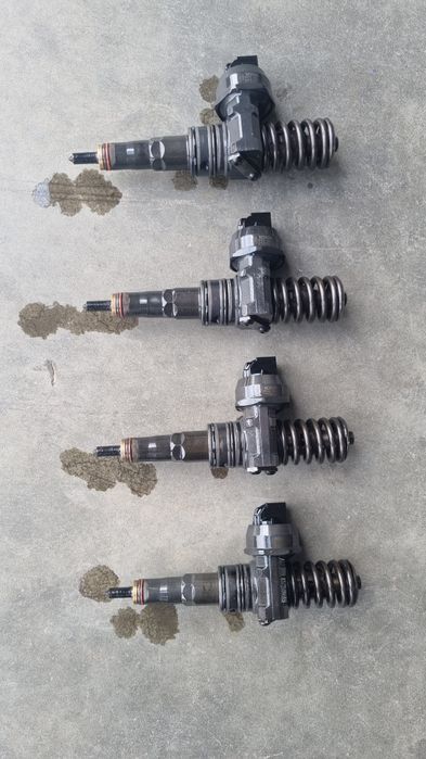 Injectoare vw golf 5 1.9 tdi cod motor bkc cod injector 038130073ag