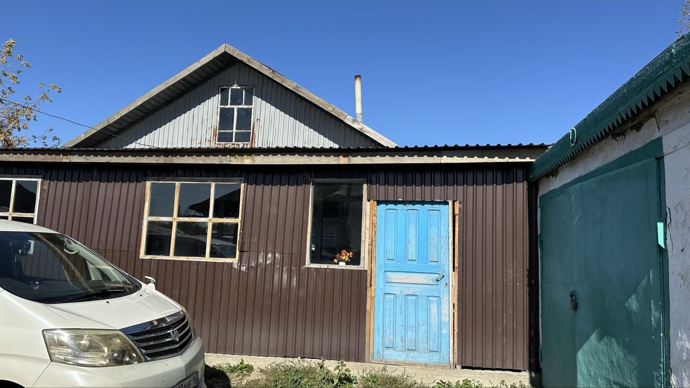 Частный деревянный дом в центре крыша новя вода в доме