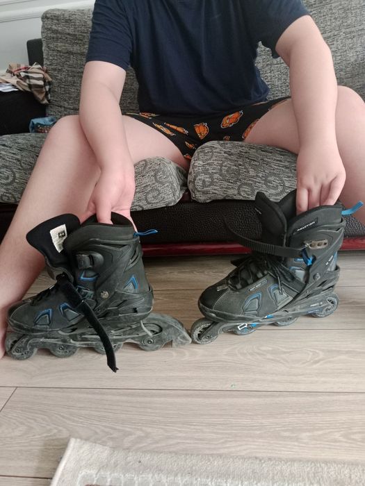 Роликовые коньки