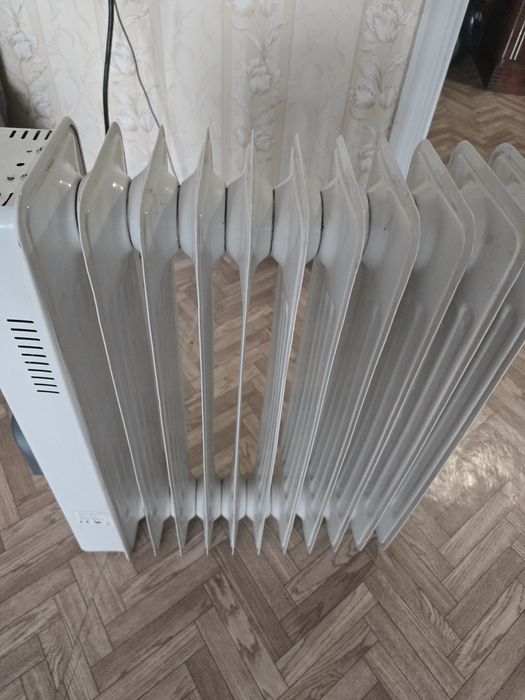 Маслянный обогреватель