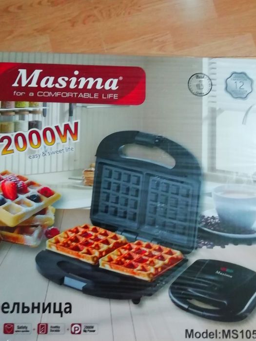 Вафельница новая в упаковке.