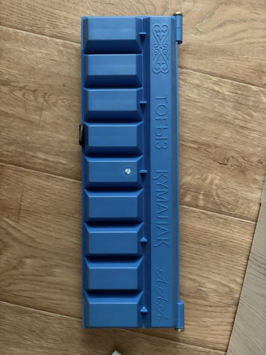 Настольная игра тоғызқұмалақ