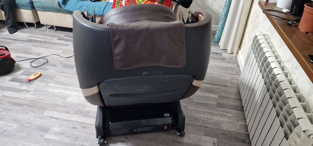 Массажный кресло