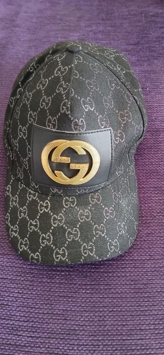 Șapcă (unisex) este o șapcă fake de la brandul Gucci