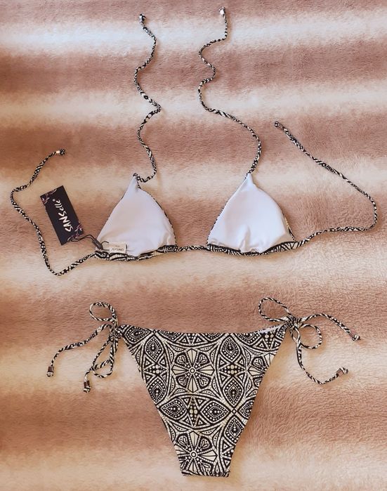 Продавам - Нов дамски бански - S/M размер - бледо жълт цвят с черно.