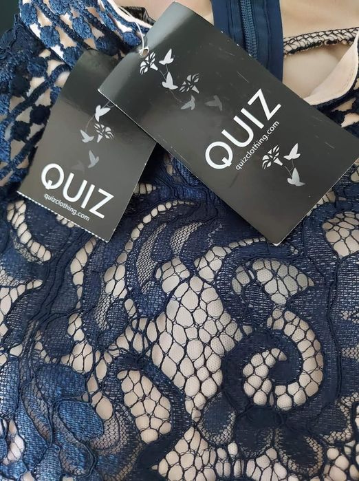 Елегантна коктейлна рокля на QUIZ