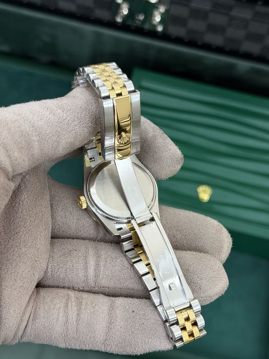 Rolex Datejust 31 Yellow Rolesor – Green Diamond Dial Jubilee