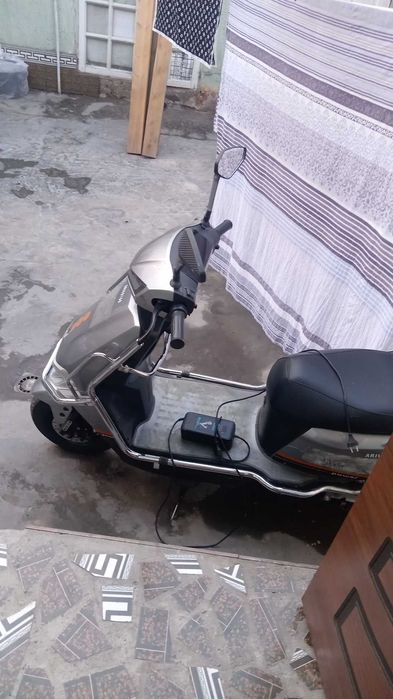 Скутер тотоолиооироо