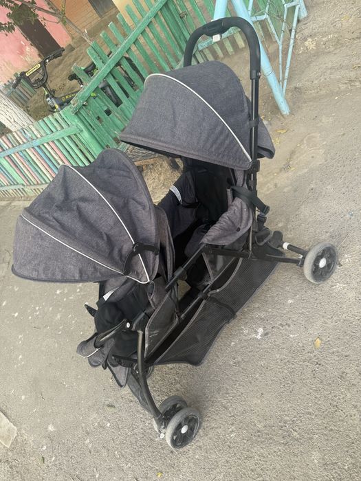 Коляска для погодок