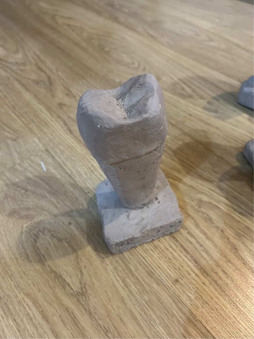 Моделирани зъби от глина