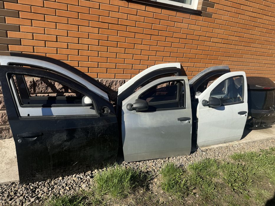 Двери на Рено Дастера оригинал