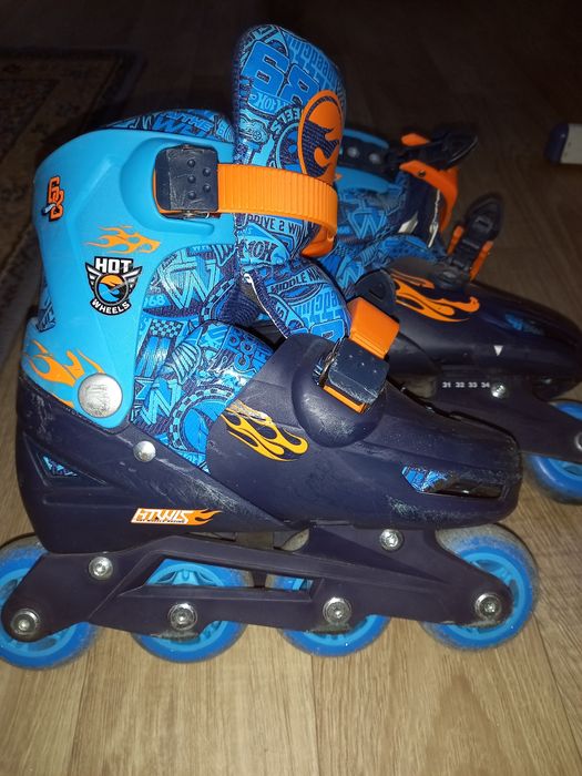 Роликовые коньки