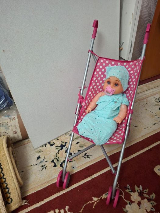 Кукла с коляской