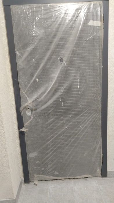 Сыртқы есік қаланың үй