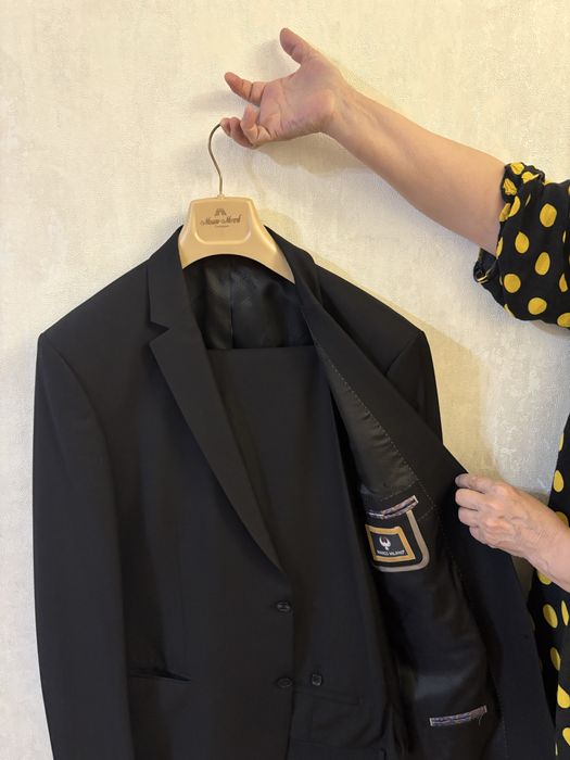 Продам костюм 56 размер