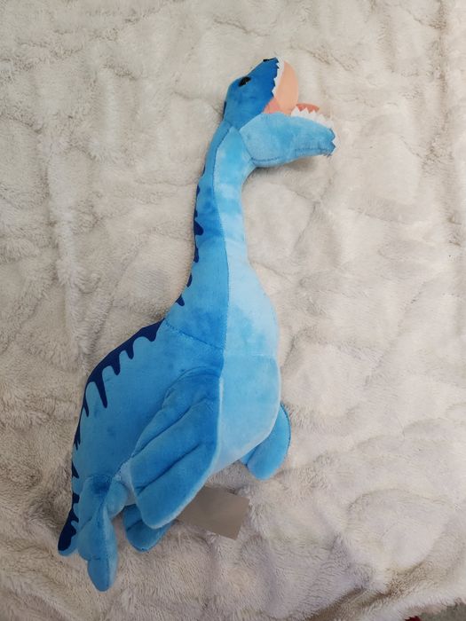 Динозавр игрушка