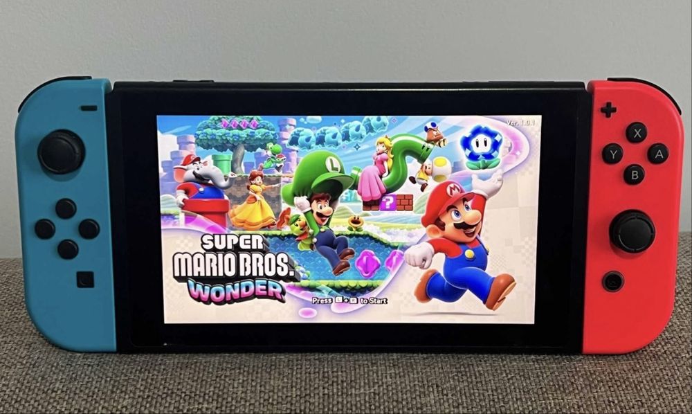 Consola gaming nintendo switch , modat cu 50 jocuri , pachet full