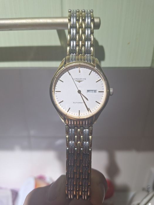 Продам часы Longines хорошая состояние смотрите в каспа цене все работ