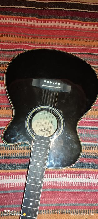 Gitara yangi holati a'lo darajada
