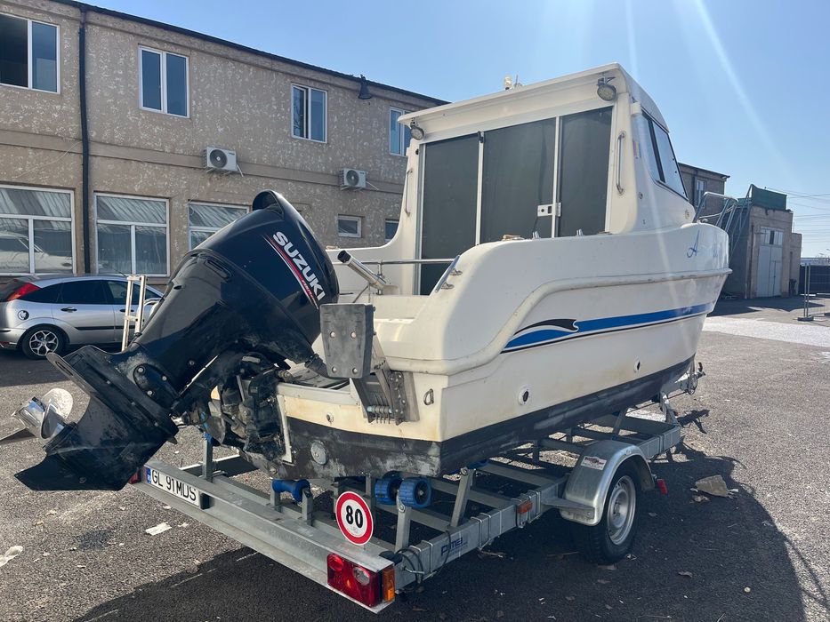 Barcă Saver Manta 21 Fisher cu motor Suzuki 140 cp și peridoc