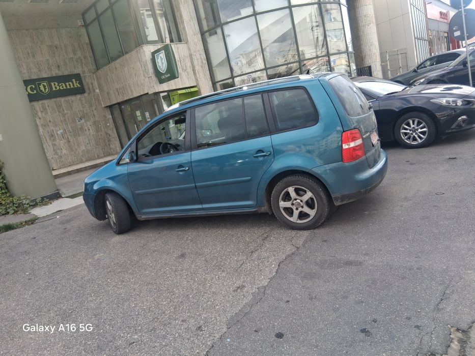 Touran an  2004 ..motor20.  140  cai  dsg bks