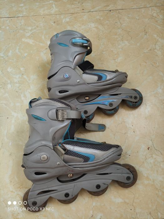 Роликовые коньки