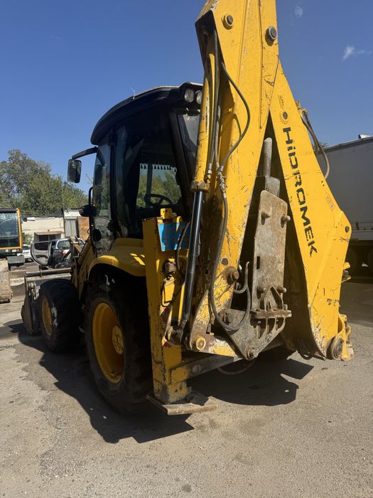 Услули экскаватор погрузчика