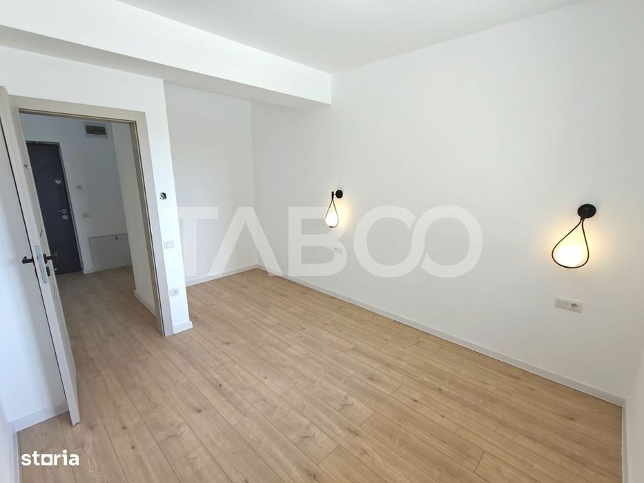 Apartament 3 camere decomandat - 2 bai - balcon - parcare - intabulat
