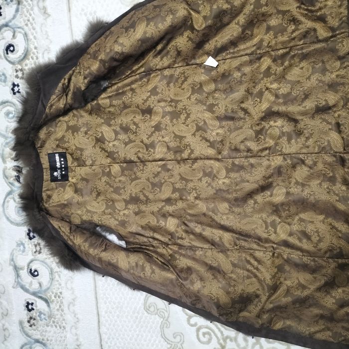 Безрукавка в продаже