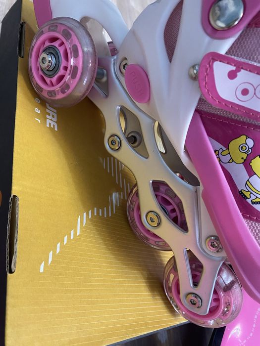 Роликовые коньки