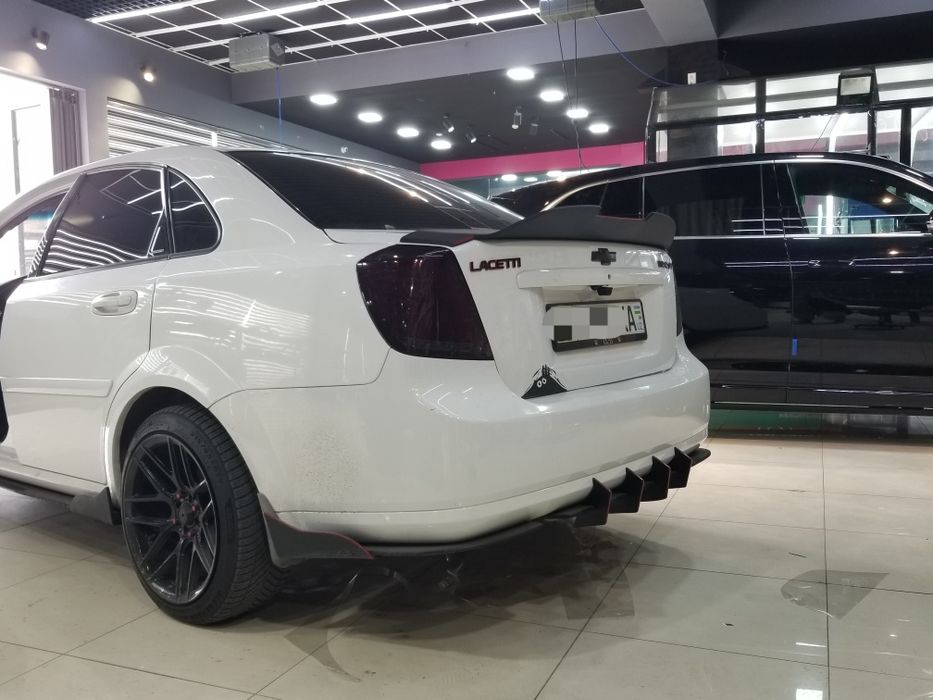 Обвес Lacetti Complekt. Обвес бампера Ласетти.