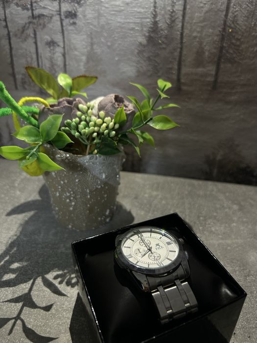 Продам стильные часы Rick