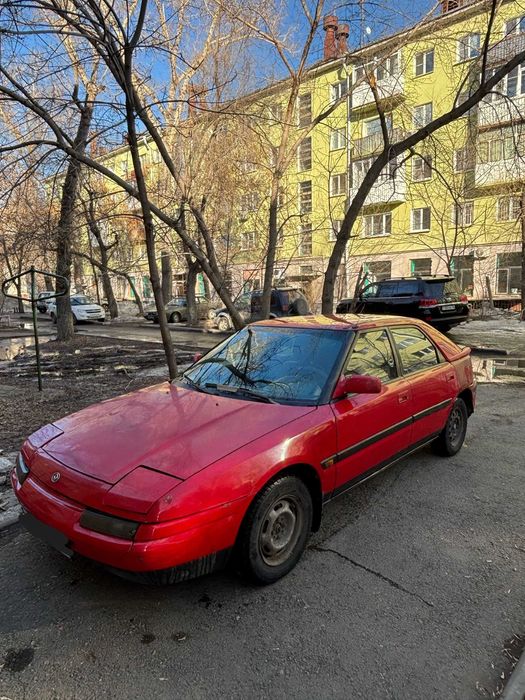 Мазда 323 с фарами-глазками