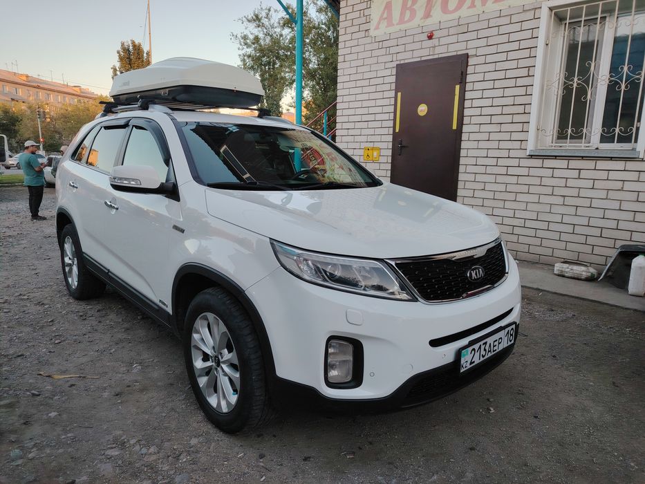 Kia sorento 2013 год