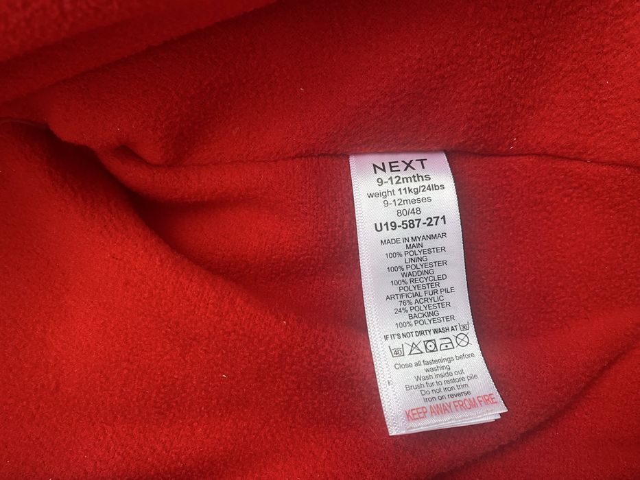 Продавам в отлично състояние ескимос Next 9-12 месеца до 11 кг