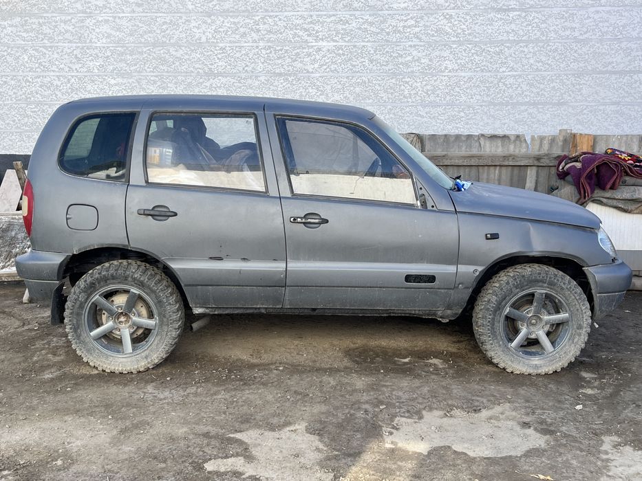 Шевролет    Нива