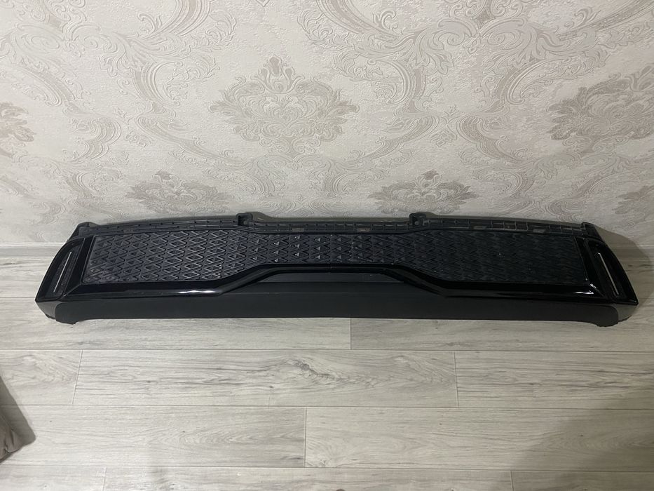 Бампер задняя часть (губа)