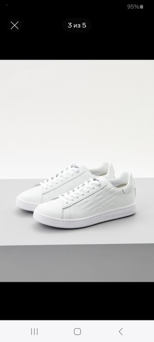 Продаются белые кеды EА7