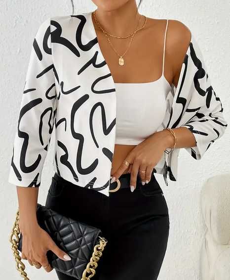 Късо яке без закопчаване с 3/4 ръкав в бяло и черно