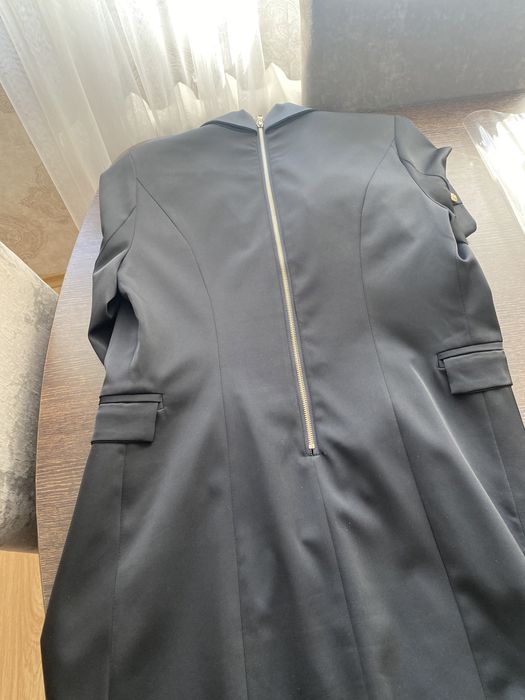 Женское платье на пуговицах