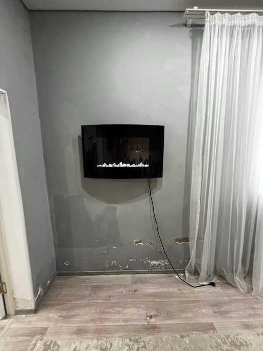 Продаёца электрический камин фирмы Electrolux