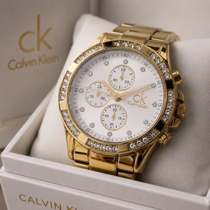 Луксозен дамски часовник CK Gold Crystal – златиста гривна и кристали