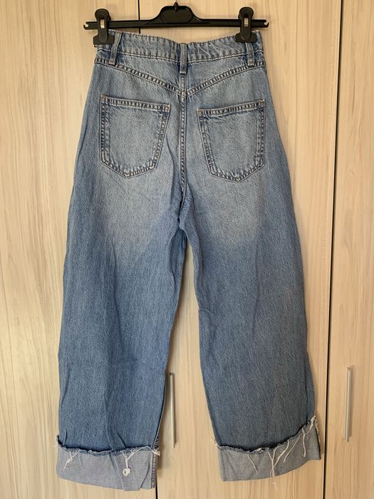 Дънки с подгънати широки крачоли