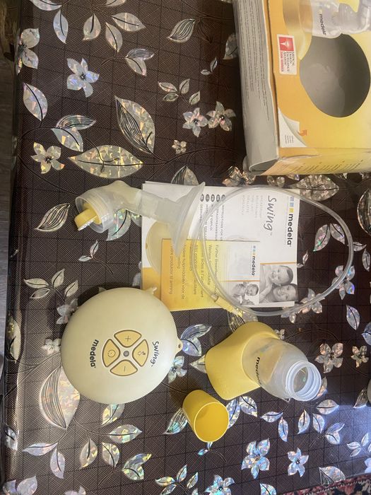 Продам молокоотсос электрический