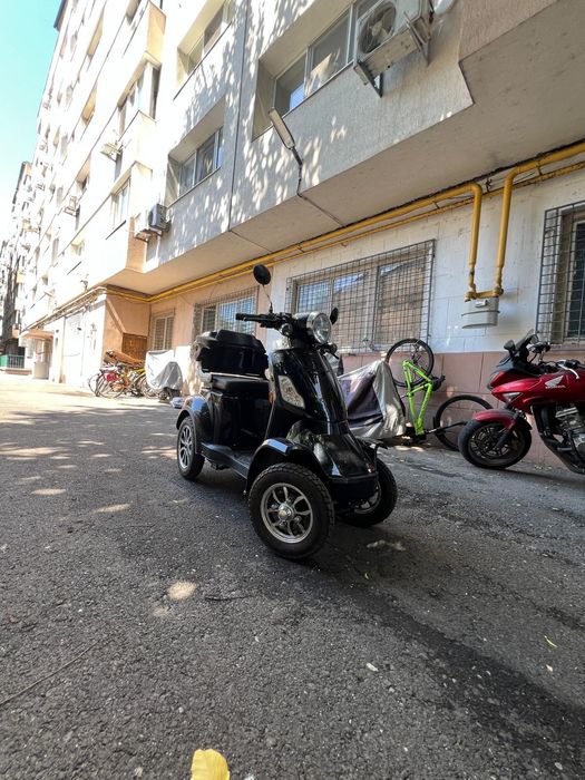Scuter electruc pentru persoane cu dizabilitați
