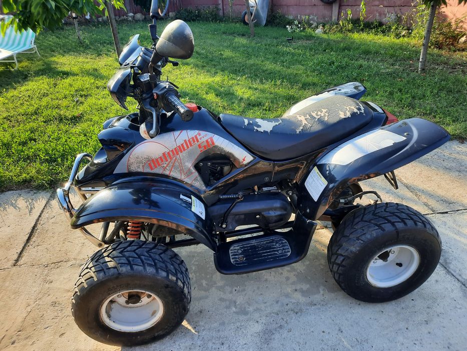Vand ATV DEFENDER 50 impecabil la SUPER PRET!