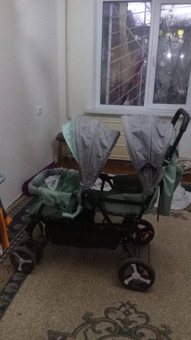 Коляска для двоих двойни